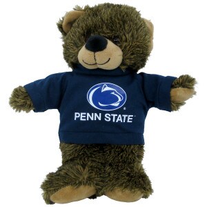 brindle plush bear wearing navy shirt with Penn State and Athletic Logo
